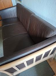 Sofa i mørke brunt læder