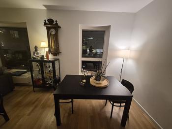 Black wooden extendable dining table – seats 4 to 6 (USED)