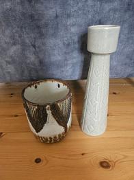 Høj lysestage og potteskjuler gives væk