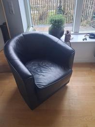 Two leather armchairs from a non-smoking home