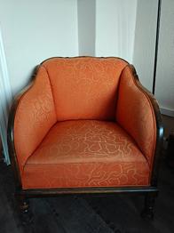 Orange vintage lænestol med træstel